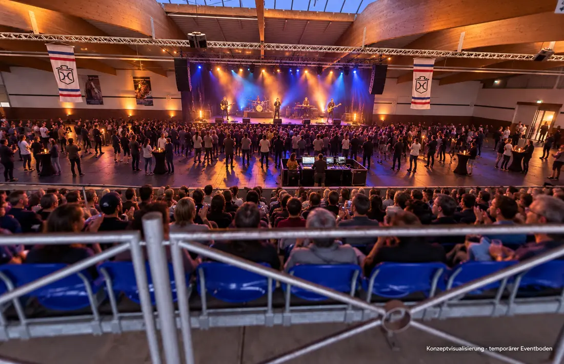 Konzeptvisualisierung: Konzert mit Bühnenlicht in der Fritz-Thiedemann-Halle, Publikum im Innenraum und auf der Tribüne